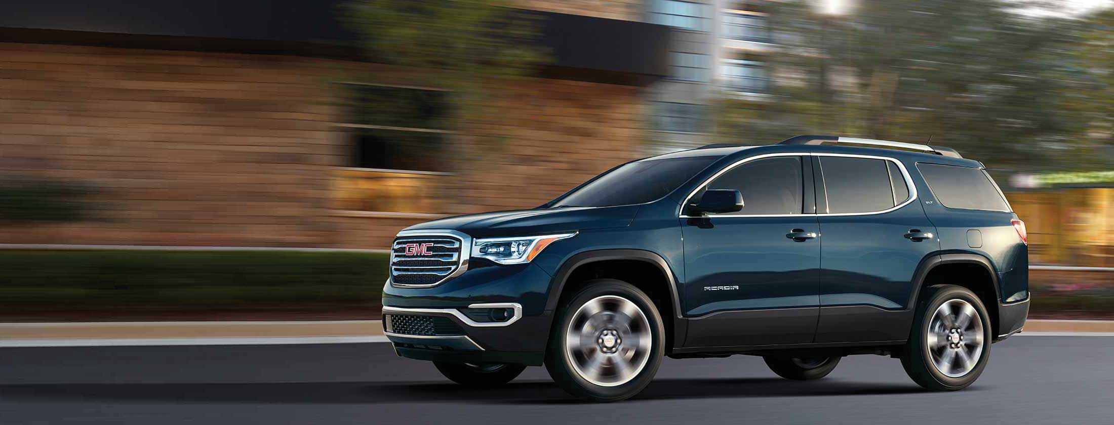 GMC SUV on the road - Pogue GMC in POWDERLY KY