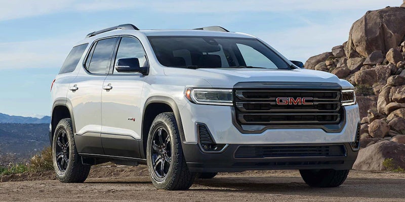 White GMC parked on hill City View