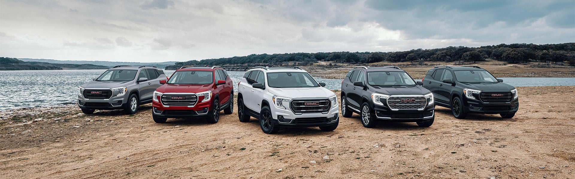 Group of GMC Terrain parked on beach